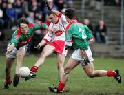 9 April 2006; Philip Jordan, Tyrone, is tackled by Billy Joe Padden, Mayo. Allianz National Football League, Division 1A, Round 7, Mayo v Tyrone, McHale Park, Castlebar, Co. Mayo. Picture credit: Oliver McVeigh / SPORTSFILE