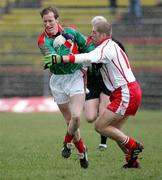 9 April 2006; James Nallen, Mayo, in action against Kevin Hughes, Tyrone. Allianz National Football League, Division 1A, Round 7, Mayo v Tyrone, McHale Park, Castlebar, Co. Mayo. Picture credit: Oliver McVeigh / SPORTSFILE