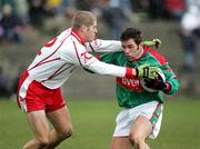 9 April 2006; James Gill, Mayo, in action against Kevin Hughes, Tyrone. Allianz National Football League, Division 1A, Round 7, Mayo v Tyrone, McHale Park, Castlebar, Co. Mayo. Picture credit: Oliver McVeigh / SPORTSFILE