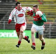 9 April 2006; David Heaney, Mayo, in action against Colin Holmes, Tyrone. Allianz National Football League, Division 1A, Round 7, Mayo v Tyrone, McHale Park, Castlebar, Co. Mayo. Picture credit: Oliver McVeigh / SPORTSFILE