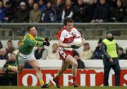 9 April 2006; Barry McGoldrick, Derry, in action against Daithi Regan, Meath. Allianz National Football League, Division 1B, Round 7, Meath v Derry, Pairc Tailteann, Navan, Co. Meath. Picture credit: Pat Murphy / SPORTSFILE