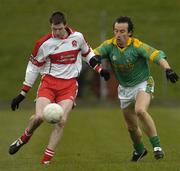 9 April 2006; Enda Muldoon, Derry, in action against Anthony Moyles, Meath. Allianz National Football League, Division 1B, Round 7, Meath v Derry, Pairc Tailteann, Navan, Co. Meath. Picture credit: Pat Murphy / SPORTSFILE