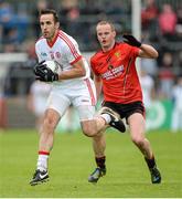18 May 2014; Mark Donnelly, Tyrone, in action against Brendan Coulter, Down. Ulster GAA Football Senior Championship Preliminary Round, Tyrone v Down, Healy Park, Omagh, Co. Tyrone. Picture credit: Oliver McVeigh / SPORTSFILE