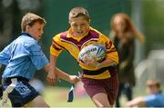 21 May 2014; Dwayne Byrne, Scoil Chiaráin, Donnycarney, in action against Dylan Maher, Our Lady Immaculate National School, Darndale during a DCC Blitz. Irishtown Stadium, Ringsend, Dublin. Picture credit: Matt Browne / SPORTSFILE