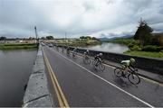 21 May 2014; The breakaway group passes through Killorglin, Co. Kerry, during Stage 4 of the 2014 An Post Rás. Charleville - Cahirciveen. Picture credit: Ramsey Cardy / SPORTSFILE