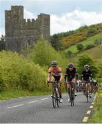 21 May 2014; The peloton passes Glenquin Castle, Co. Limerick, during Stage 4 of the 2014 An Post Rás. Charleville - Cahirciveen. Picture credit: Ramsey Cardy / SPORTSFILE