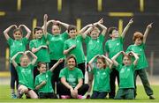 22 May 2014; Irish Long Jump record holder Kelly Proper with children who took part in the launch of the Forest Feast Athletics Summer Camp. Morton Stadium, Santry, Dublin. Picture credit: Matt Browne / SPORTSFILE
