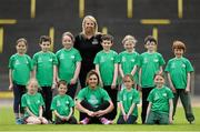 22 May 2014; Irish Long Jump record holder Kelly Proper and Christine Whelan, Forest Feast Sales Manager Ireland, with children who took part in the launch of the Forest Feast Athletics Summer Camp. Morton Stadium, Santry, Dublin. Picture credit: Matt Browne / SPORTSFILE