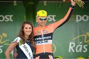 22 May 2014; Marcin Bialoblocki, Velosure Giordana, is presented with the stage winners jersey by Miss An Post Rás Clonakilty Emma O'Sullivan after Stage 5 of the 2014 An Post Rás. Cahirciveen - Clonakilty. Picture credit: Ramsey Cardy / SPORTSFILE