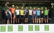 22 May 2014; On the podium after Stage 5 of the 2014 An Post Rás are, from left to right, Miss An Post Rás Clonakilty Emma O'Sullivan, Marcin Bialoblocki, Velosure Giordana, Alex Peters, Madison Genesis, Clemens Fankhauser, Tirol Cycling Team, Ian Biddy, Madison Genisis, Alessandro Pettiti, Team IDEA 2010, Peter Willems, Bretagne Velotec , Sean Lacey, Cork City, James Davenport, South Dublin, and Patrick Bevin, New Zealand National Team. Cahirciveen - Clonakilty. Picture credit: Ramsey Cardy / SPORTSFILE