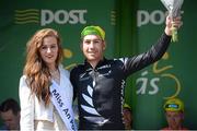 21 May 2014; Patrick Bevin, New Zealand National Team, is presented with the yellow jersey by, Miss An Post Rás, Lauren O'Sullivan after Stage 4 of the 2014 An Post Rás. Charleville - Cahirciveen. Picture credit: Ramsey Cardy / SPORTSFILE