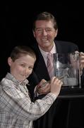 10 April 2006; European Ryder Cup team Vice Captain Des Smyth and 11 year old Conor Sutton, Kinsealy, engrave a piece of Waterford Crystal at the launch of the new Waterford Crystal 2006 Ryder Cup Commemorative Collection. With only 500 in existence in the world, the hand engraved crystal centrepiece depicts the treacherous approach to the 18th hole with the K Club Clubhouse in the backdrop. Westin Hotel, Dublin. Picture credit: Ray McManus / SPORTSFILE