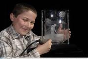 10 April 2006; Eleven year old Connor Sutton, Kinsealy, engraves a piece of Waterford Crystal at the launch of the new Waterford Crystal 2006 Ryder Cup Commemorative Collection. With only 500 in existence in the world, the hand engraved crystal centrepiece depicts the treacherous approach to the 18th hole with the K Club Clubhouse in the backdrop. Westin Hotel, Dublin. Picture credit: Ray McManus / SPORTSFILE