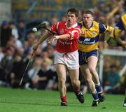 4 July 1999; Alan Browne of Cork in action against John Reddin of Clare during the Munster Senior Hurling Championship Final match between Cork and Clare at Semple Stadium in Thurles, Tipperary. Photo by Brendan Moran/Sportsfile