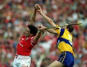 4 July 1999; Alan Browne of Cork in action against Liam Doyle of Clare during the Munster Senior Hurling Championship Final match between Cork and Clare at Semple Stadium in Thurles, Tipperary. Photo by Brendan Moran/Sportsfile