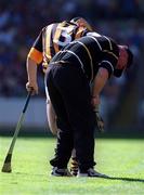 11 July 1999; Kilkenny manager Brian Cody adjusts the studs of Canice Brennan of Kilkenny during the Leinster Senior Hurling Championship Final match between Kilkenny and Offaly at Croke Park in Dublin. Photo by Ray McManus/Sportsfile