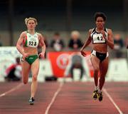 19 June 1999; Cathy Freeman of Australia, right, on her way to winning the women's 400m event ahead of Karen Shinkins of Ireland at the 1999 Cork City Sports at the Mardyke in Cork. Photo by Brendan Moran/Sportsfile