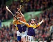 20 June 1999; Colm Kehoe and Rod Guiney of Wexford in action against Michael Duignan of Offaly during the Guinness Leinster Senior Hurling Championship Semi-Final match between Offaly and Wexford at Croke Park in Dublin. Photo by Ray McManus/Sportsfile
