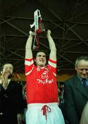 4 July 1999; Cork captain Mark Landers lifts the trophy following the Munster Senior Hurling Championship Final match between Cork and Clare at Semple Stadium in Thurles, Tipperary. Photo by Damien Eagers/Sportsfile