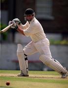 30 June 1999; Barry Archer of Ireland hits for a four during the Triple Crown Tournament match between Ireland and Wales at Leinster Cricket Club in Dublin. Photo by Brendan Moran/Sportsfile