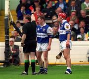 20 June 1999; Cyril Cuddy of Laois is shown a red card by referee Michael Wadding during the Guinness Leinster Senior Hurling Championship Semi-Final match between Kilkenny and Laois at Croke Park in Dublin. Photo by Ray McManus/Sportsfile