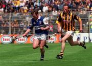 20 June 1999; Cyril Cuddy of Laois in action against Andy Comerford of Kilkenny during the Guinness Leinster Senior Hurling Championship Semi-Final match between Kilkenny and Laois at Croke Park in Dublin. Photo by Aoife Rice/Sportsfile