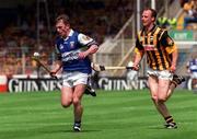 20 June 1999; Cyril Cuddy of Laois in action against Andy Comerford of Kilkenny during the Guinness Leinster Senior Hurling Championship Semi-Final match between Kilkenny and Laois at Croke Park in Dublin. Photo by Aoife Rice/Sportsfile