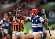 20 June 1999; DJ Carey of Kilkenny in action against Bill Maher of Laois during the Guinness Leinster Senior Hurling Championship Semi-Final match between Kilkenny and Laois at Croke Park in Dublin. Photo by Ray McManus/Sportsfile