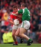 20 June 1999; Damien O'Neill of Cork, in action against Diarmuid Sheehy of Limerick during the Munster Senior Football Championship Semi-Final match between Cork and Limerick at Páirc Uí Rinn in Cork. Photo by Brendan Moran/Sportsfile