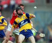 4 July 1999;  Danny Scanlon of Clare in action against Mark Landers of Cork during the Munster Senior Hurling Championship Final match between Cork and Clare at Semple Stadium in Thurles, Tipperary. Photo by Brendan Moran/Sportsfile