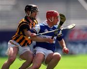 20 June 1999; David Cuddy of Laois in action against Denis Byrne of Kilkenny during the Guinness Leinster Senior Hurling Championship Semi-Final match between Kilkenny and Laois at Croke Park in Dublin. Photo by Ray McManus/Sportsfile