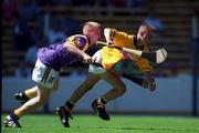 11 July 1999; David Herity of Kilkenny in action against Ray Freeman of Wexford during the Leinster Minor Hurling Championship Final match between Kilkenny and Wexford at Croke Park in Dublin. Photo by Brendan Moran/Sportsfile