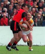 20 June 1999; Declan Gallagher of Antrim in action against Michael Magill of Down during the Bank of Ireland Ulster Senior Football Championship Quarter-Final match between Down and Antrim at Pairc Esler in Newry, Down. Photo by David Maher/Sportsfile
