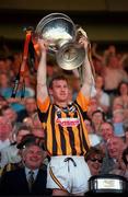 11 July 1999; Kilkenny captain Denis Byrne lifts the Bob O'Keeffe cup following the Leinster Senior Hurling Championship Final match between Kilkenny and Offaly at Croke Park in Dublin. Photo by Brendan Moran/Sportsfile