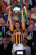 11 July 1999; Kilkenny captain Denis Byrne lifts the Bob O'Keeffe cup following the Leinster Senior Hurling Championship Final match between Kilkenny and Offaly at Croke Park in Dublin. Photo by Ray McManus/Sportsfile