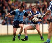 27 June 1999; Derek Conroy of Laois in action against Thomas Lynch of Dublin during the Leinster Senior Football Championship Semi-Final match between Dublin and Laois at Croke Park in Dublin. Photo by Aoife Rice/Sportsfile
