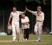 29 June 1999; Craig Wright, left, and Douglas Lockhart of Scotland celebrate after taking a wicket during the Triple Crown Tournament match between Ireland and Scotland at Castle Avenue in Dublin. Photo by Damien Eagers/Sportsfile