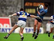 27 June 1999; Enda Sheehy of Dublin in action against Eamonn Delaney of Laois during the Leinster Senior Football Championship Semi-Final match between Dublin and Laois at Croke Park in Dublin. Photo by Brendan Moran/Sportsfile