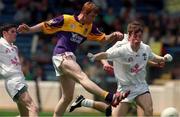 4 July 1999; Eric Bradley of Wexford shoots to score the winning goal during the Leinster Minor Football Championship Semi-Final match between Wexford and Offaly at Croke Park in Dublin. Photo by Matt Browne/Sportsfile