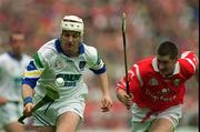 13 June 1999; Fergal Hartley of Waterford in action against Mark Landers of Cork during the Munster Senior Hurling Championship Semi-Final match between Cork and Waterford at Semple Stadium in Thurles, Tipperary. Photo by Ray McManus/Sportsfile