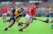 4 July 1999; Fergal Ryan of Cork in action against Alan Markham of Clare during the Munster Senior Hurling Championship Final match between Cork and Clare at Semple Stadium in Thurles, Tipperary. Photo by Damien Eagers/Sportsfile