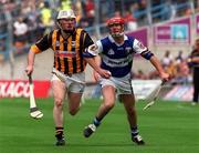 20 June 1999; Fionán O'Sullivan of Laois in action against Tom Hickey of Kilkenny during the Guinness Leinster Senior Hurling Championship Semi-Final match between Kilkenny and Laois at Croke Park in Dublin. Photo by Aoife Rice/Sportsfile