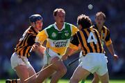 11 July 1999; Joe Dooley of Offaly in action against Denis Byrne, left, and Willie O'Connor of Kilkenny during the Leinster Senior Hurling Championship Final match between Kilkenny and Offaly at Croke Park in Dublin. Photo by Ray McManus/Sportsfile