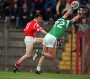 20 June 1999; Joe Kavanagh of Cork in action against Brian Begley of Limerick during the Munster Senior Football Championship Semi-Final match between Cork and Limerick at Páirc Uí Rinn in Cork. Photo by Brendan Moran/Sportsfile