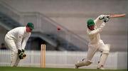 30 June 1999; John Davy of Ireland hits a four as Roger Clitheroe of Wales looks on during the Triple Crown Tournament match between Ireland and Wales at Leinster Cricket Club in Dublin. Photo by Aoife Rice/Sportsfile