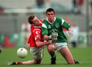 20 June 1999; John Galvin of Limerick in action against Nicholas Murphy of Cork during the Munster Senior Football Championship Semi-Final match between Cork and Limerick at Páirc Uí Rinn in Cork. Photo by Brendan Moran/Sportsfile