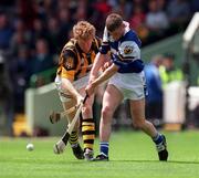 20 June 1999; Donal Russell of Laois in action against John Power of Kilkenny during the Guinness Leinster Senior Hurling Championship Semi-Final match between Kilkenny and Laois at Croke Park in Dublin. Photo by Ray McManus/Sportsfile