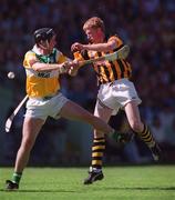11 July 1999; John Power of Kilkenny in action against Hubert Rigney of Offaly during the Leinster Senior Hurling Championship Final match between Kilkenny and Offaly at Croke Park in Dublin. Photo by Ray McManus/Sportsfile
