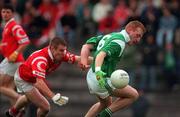 20 June 1999; John Quane of Limerick in action against Damien O'Neill of Cork during the Munster Senior Football Championship Semi-Final match between Cork and Limerick at Páirc Uí Rinn in Cork. Photo by Brendan Moran/Sportsfile