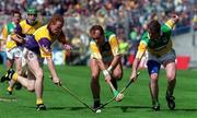 20 June 1999; Joe Dooley, centre, and Michael Duignan of Offaly in action against Rod Guiney of Wexford during the Guinness Leinster Senior Hurling Championship Semi-Final match between Offaly and Wexford at Croke Park in Dublin. Photo by Aoife Rice/Sportsfile